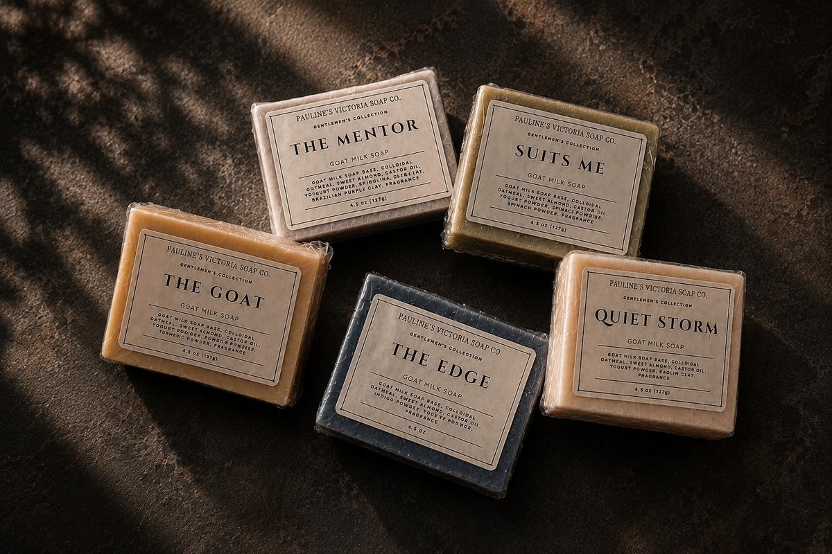 Five bars of facial cleansing soap from Palmette Vector Soap Co. arranged in a flat-lay on a dark textured surface with dappled shadows.